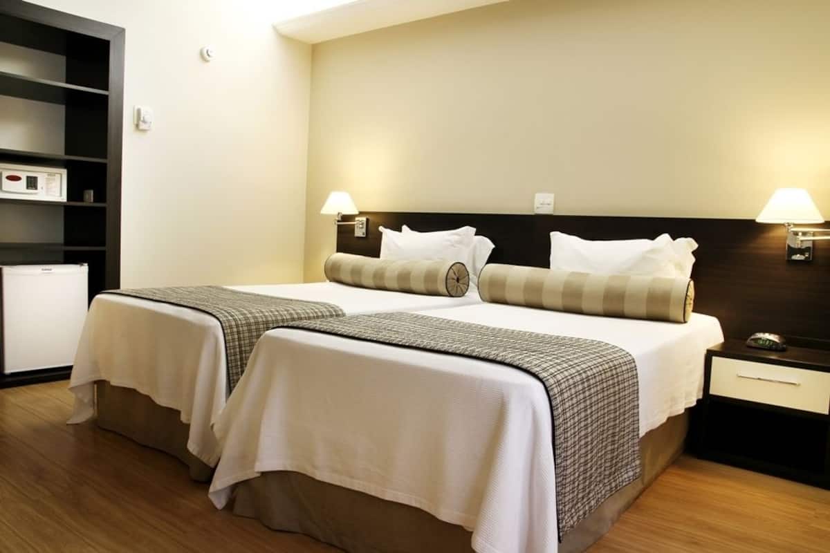 Pillow-top beds, free minibar items, in-room safe, blackout curtains
