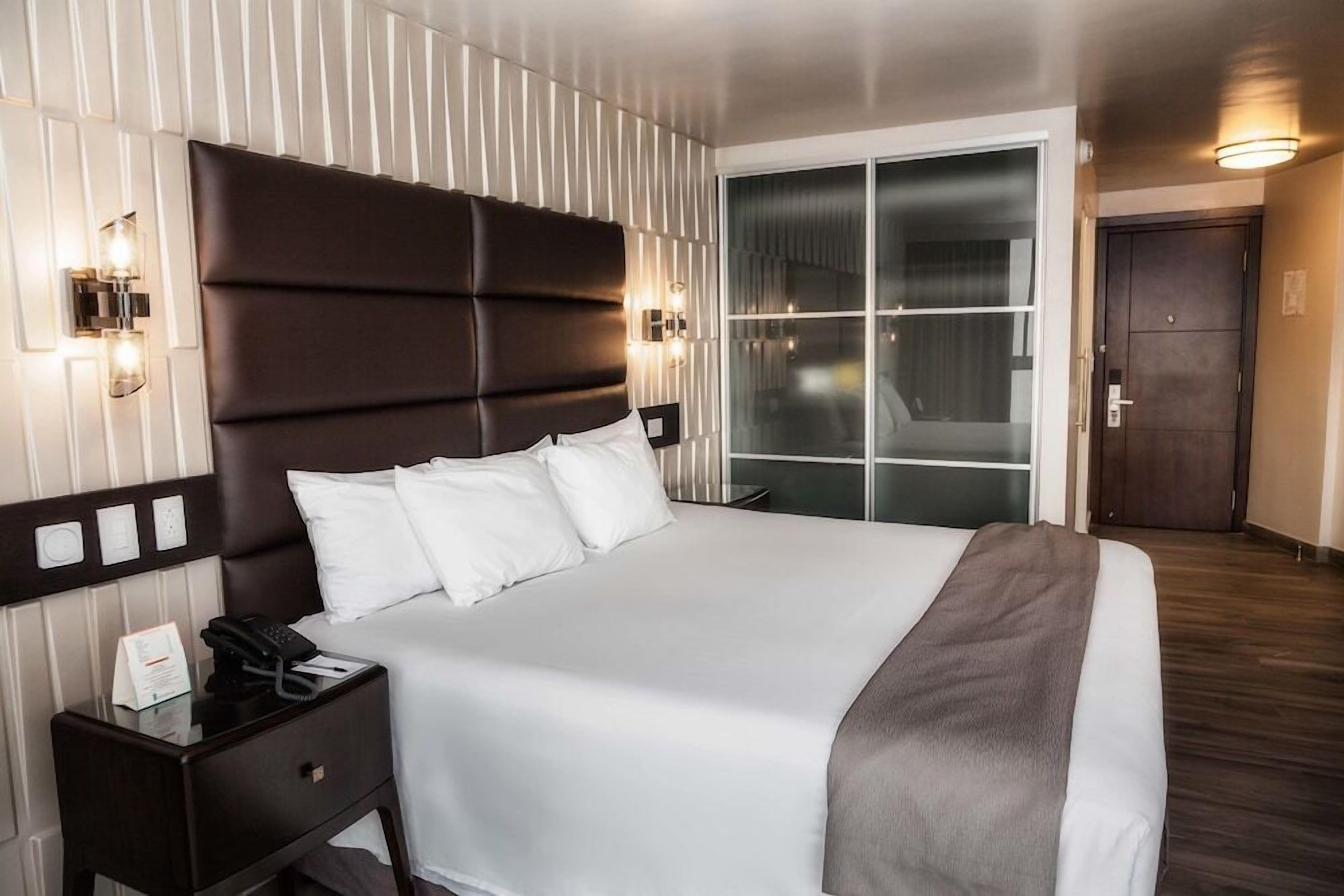 Premium bedding, down duvets, in-room safe, individually furnished