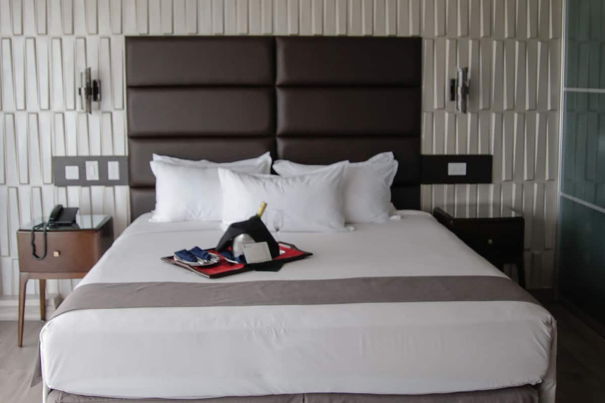 premium bedding, down duvets, in-room safe, individually furnished