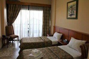 Basic Double Room, Sea View | Minibar, in-room safe, desk, iron/ironing board
