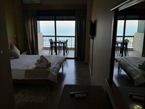 Basic Double Room, Sea View | Minibar, in-room safe, desk, iron/ironing board