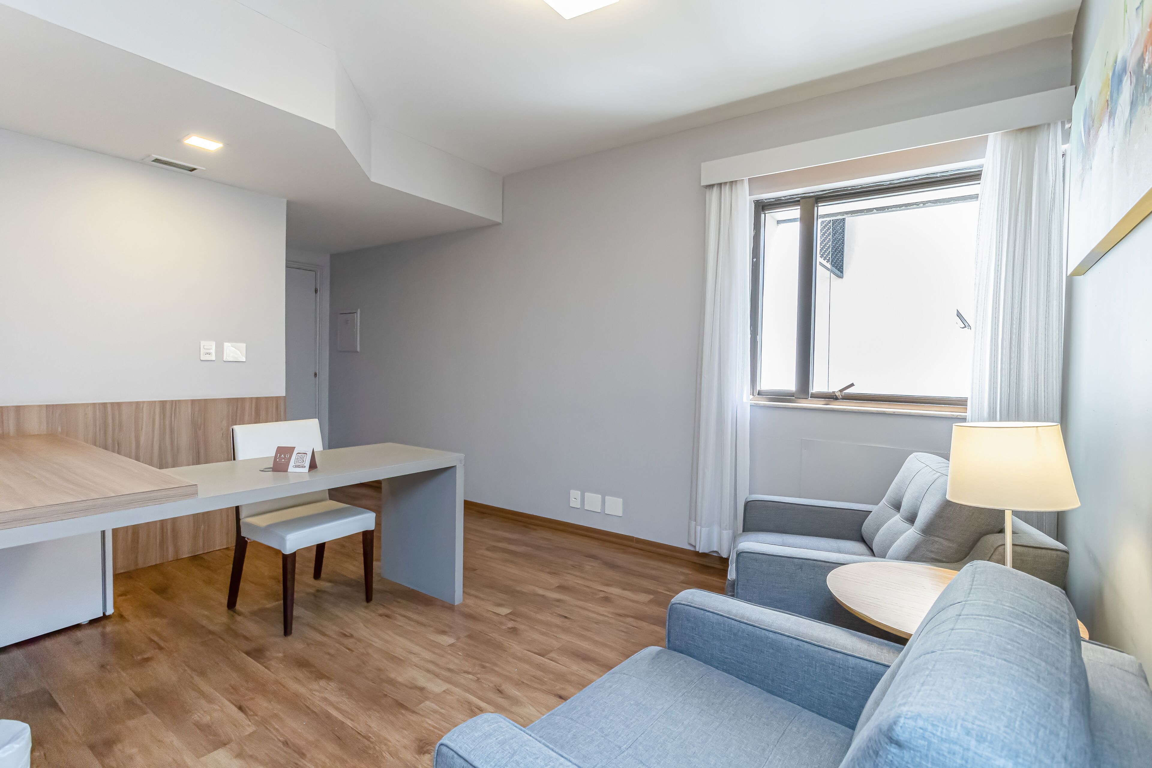 superior room | living area | 400-inch flat-screen tv with cable channels, lcd tv