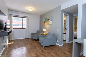 Superior Room | Living area | 400-inch flat-screen TV with cable channels, LCD TV