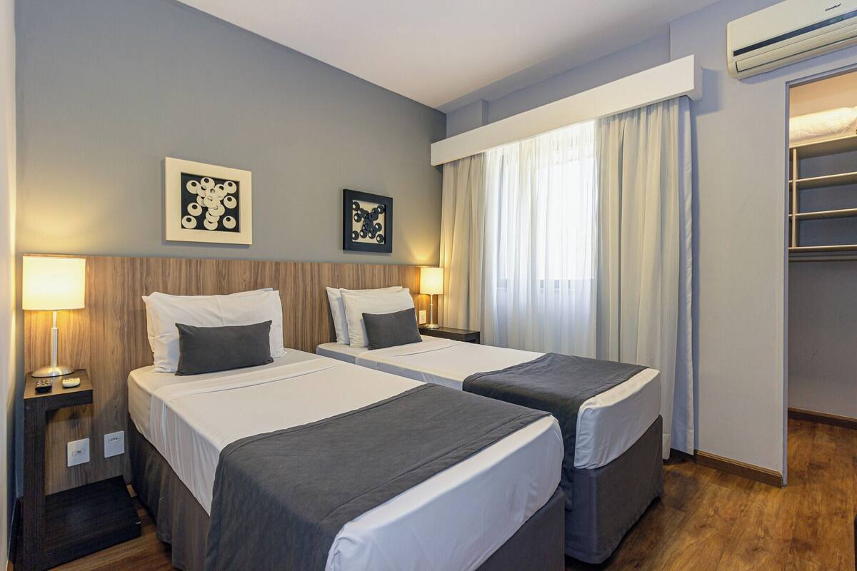Deluxe Room | Premium bedding, minibar, in-room safe, blackout drapes