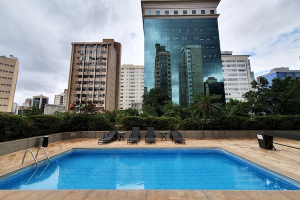 Outdoor pool, pool umbrellas, pool loungers