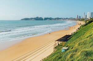Na praia, toalhas de praia 