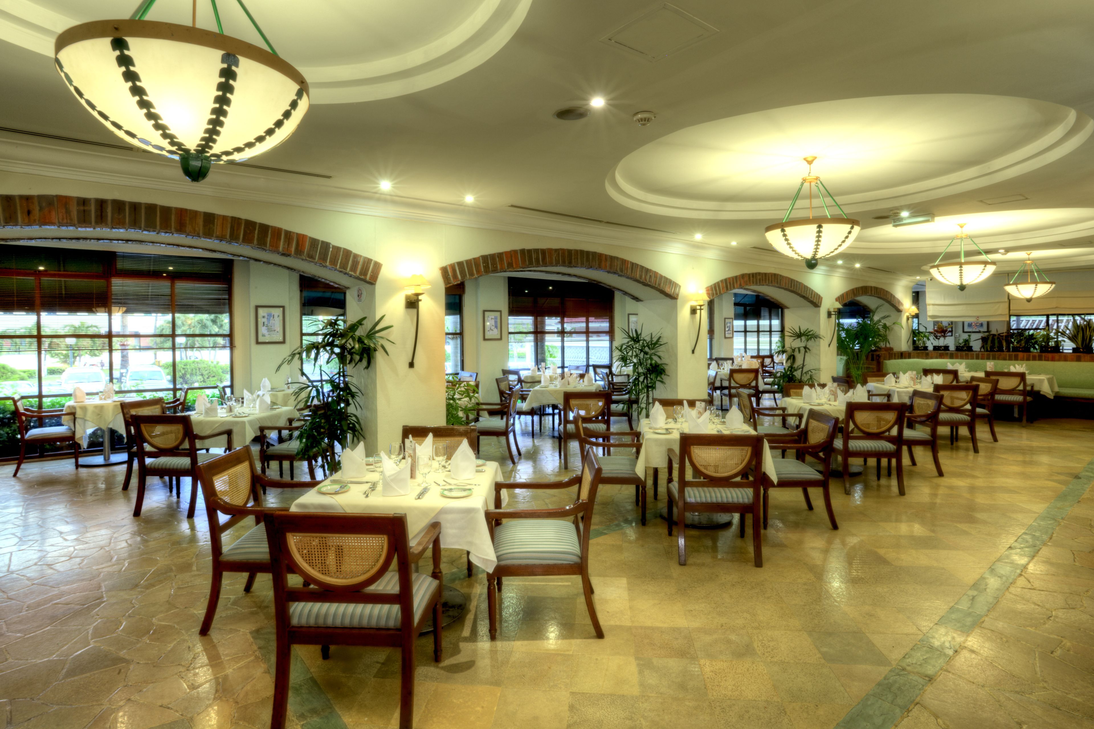 Breakfast, lunch, dinner served; international cuisine, garden views 