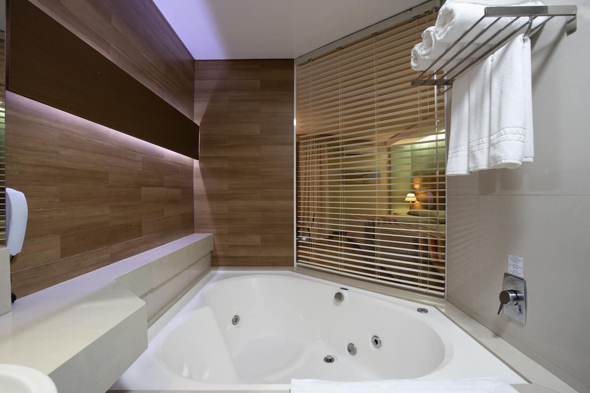 shower, hair dryer, bathrobes, towels