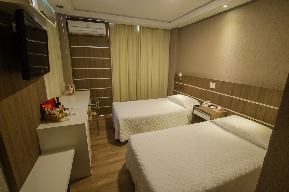 Camera Executive con 2 letti singoli | 1 camera, minibar, una cassaforte in camera, Wi-Fi gratuito