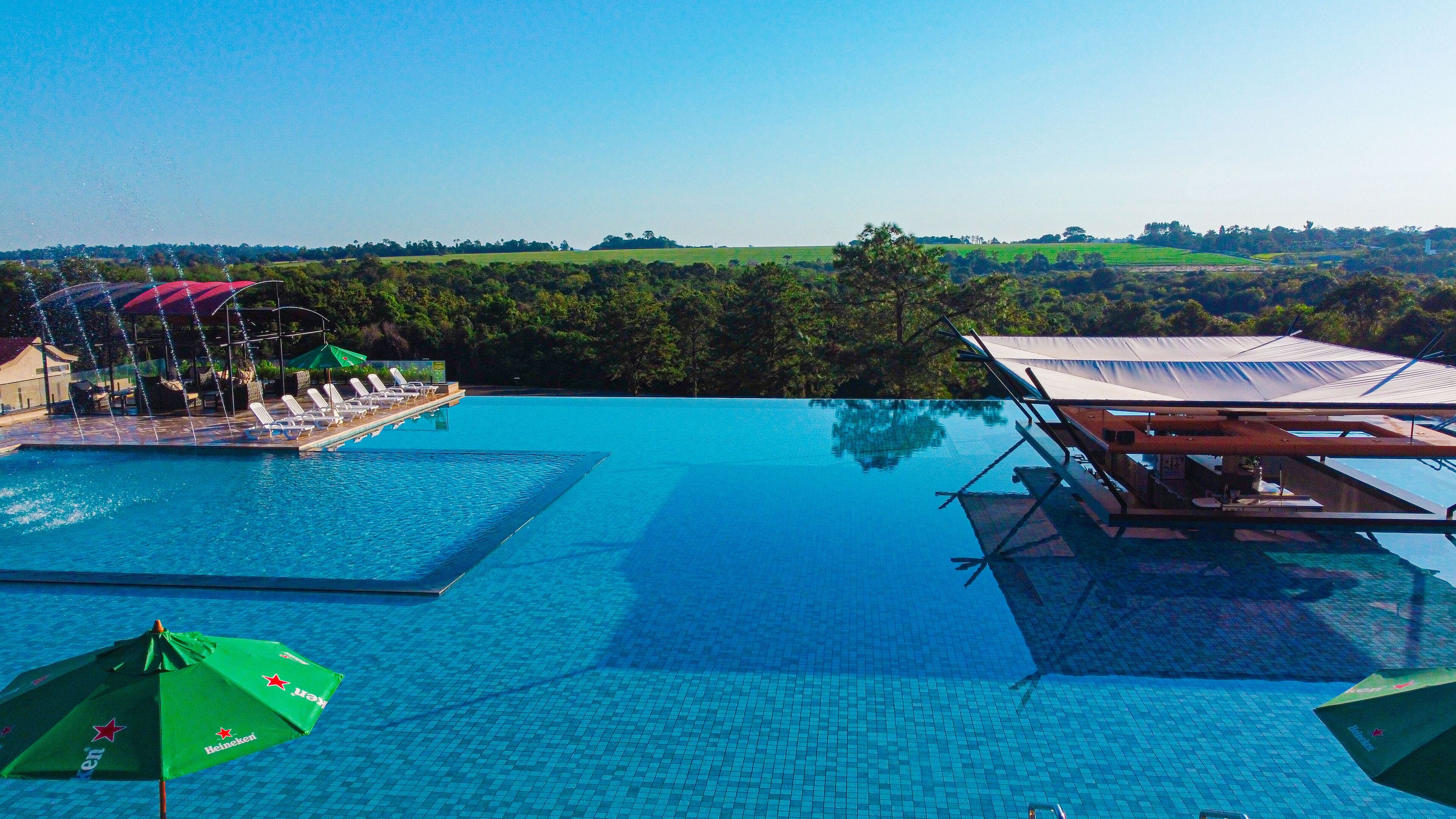 3 outdoor pools, pool umbrellas, sun loungers