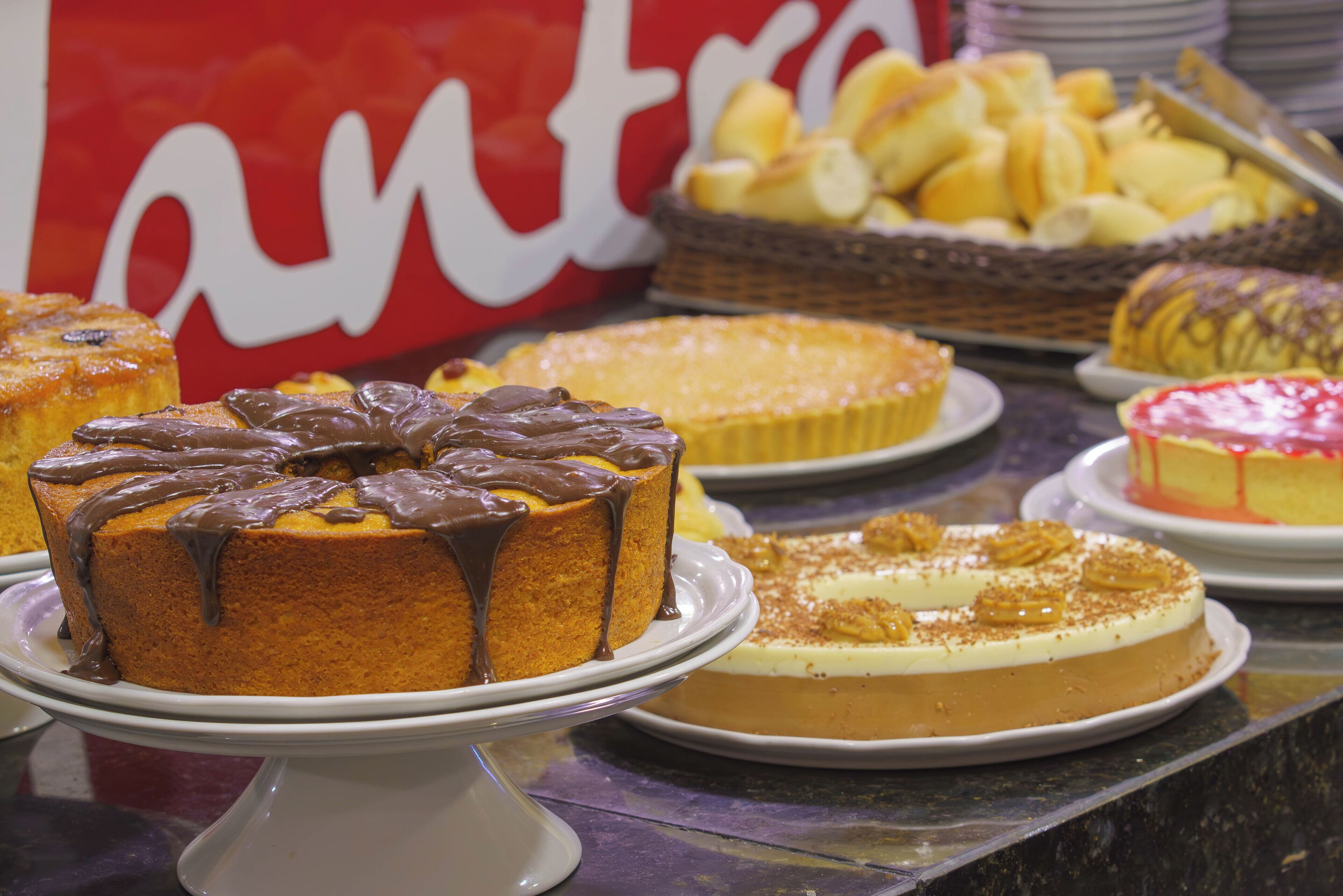 A variety of cakes and pastries on display.