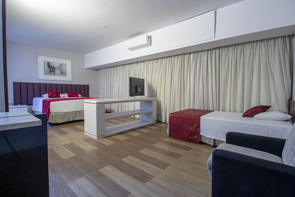Family Triple Room, Multiple Beds | 1 bedroom, minibar, in-room safe, desk