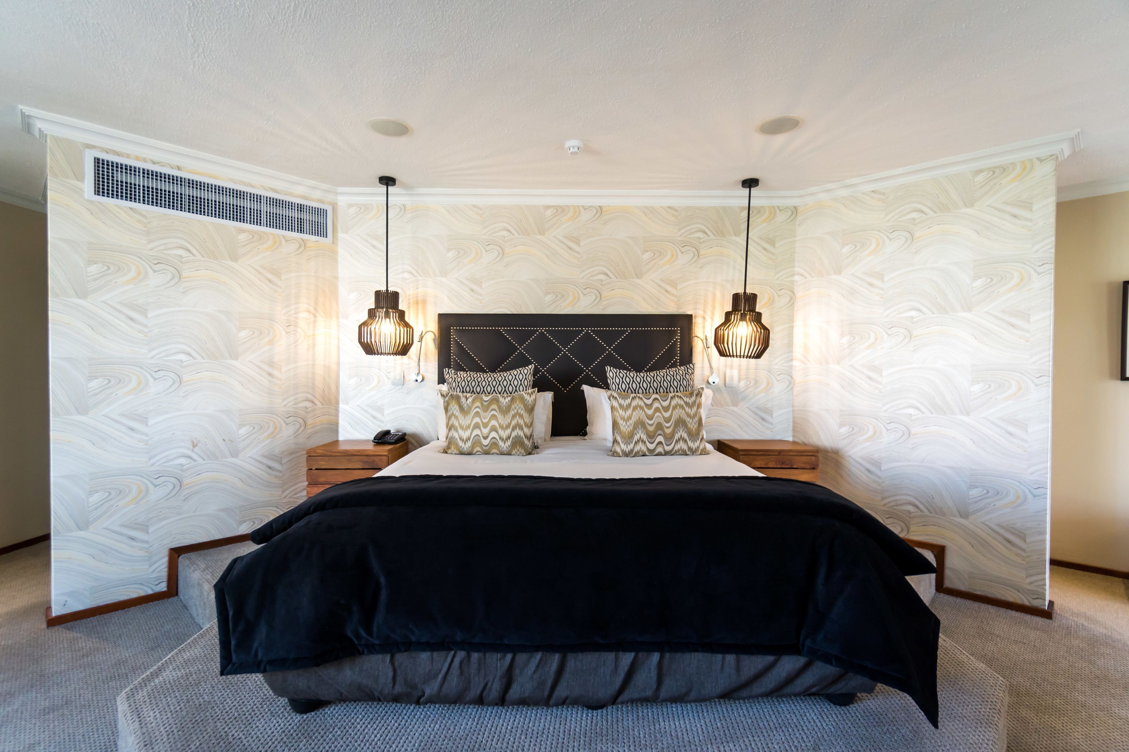 Hypo-allergenic bedding, down comforters, minibar, in-room safe