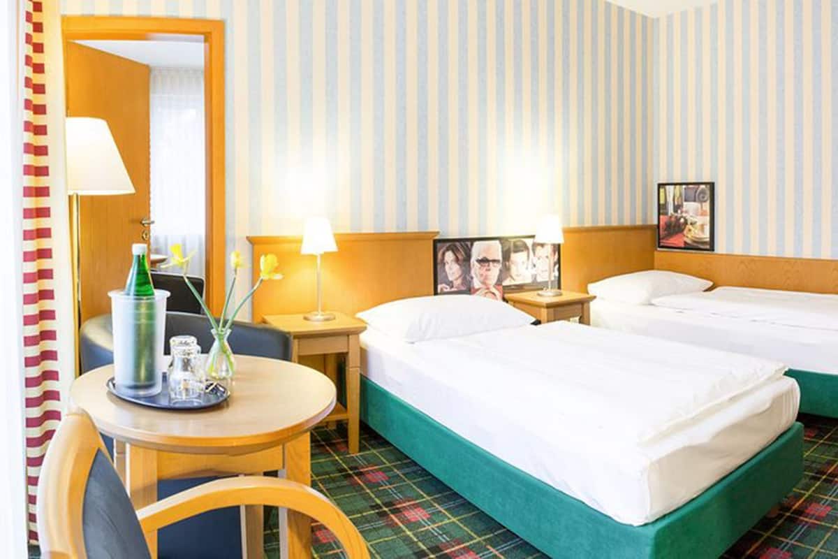 Premium bedding, in-room safe, desk, soundproofing
