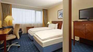 Hypo-allergenic bedding, in-room safe, desk, laptop workspace