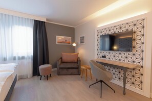 Hypo-allergenic bedding, desk, blackout drapes, soundproofing