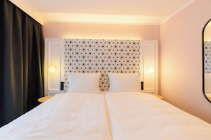Hypo-allergenic bedding, desk, blackout curtains, soundproofing