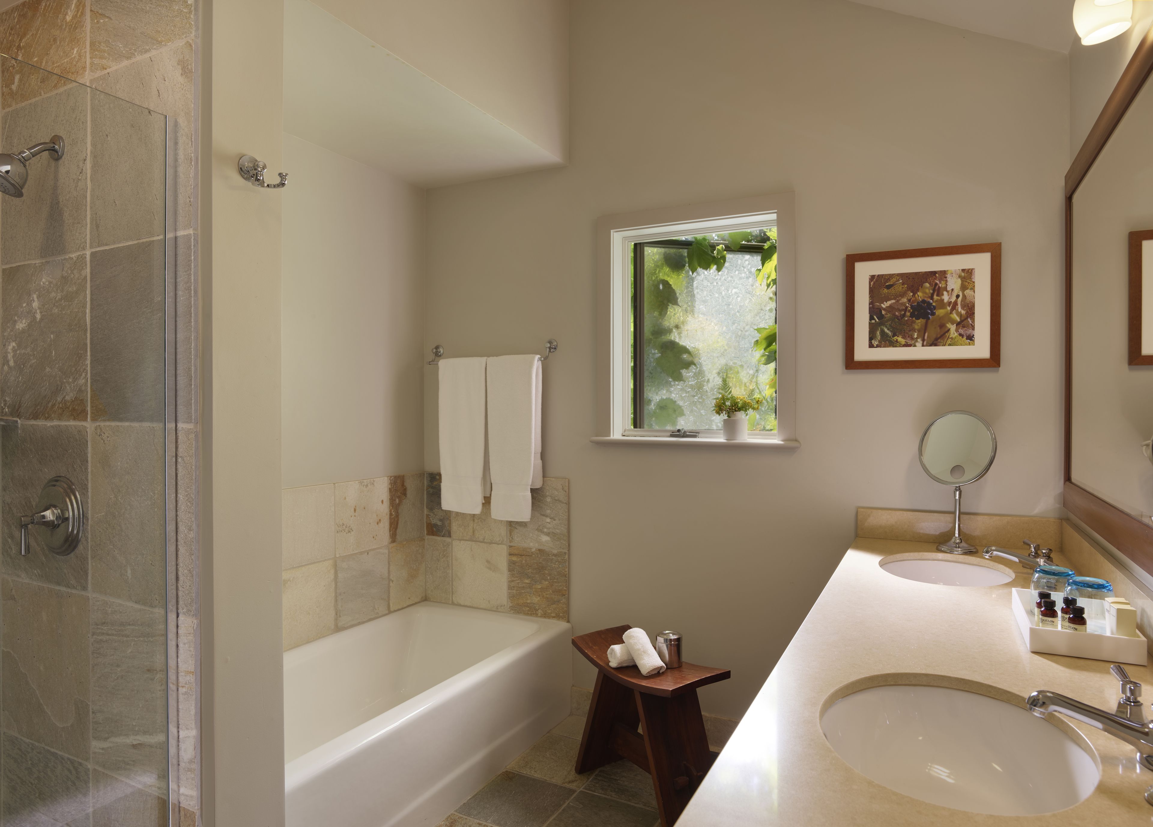 designer toiletries, hair dryer, bathrobes, slippers