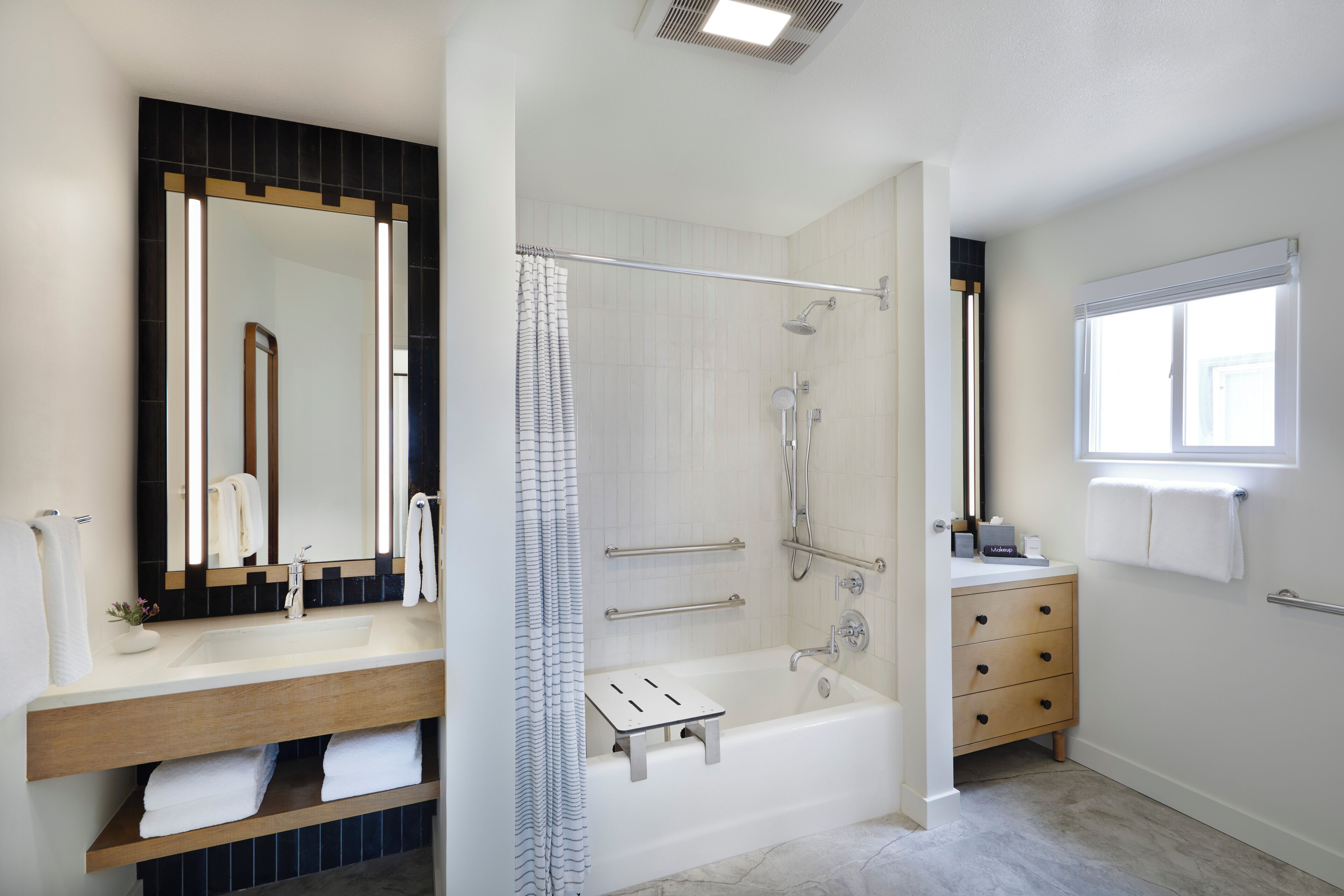 deluxe room, 1 king bed, accessible | bathroom | designer toiletries, hair dryer, bathrobes, slippers