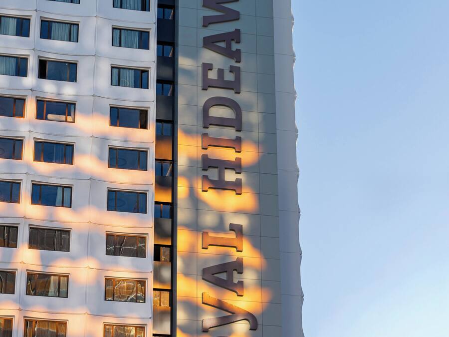 A building with a prominent sign reading 'ROYAL RIDEAWAY.'