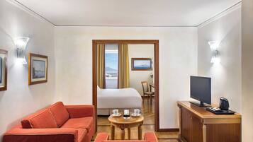 Suite, 1 Bedroom | Minibar, in-room safe, desk, soundproofing
