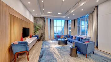 Presidential Suite, 2 Bedrooms, Kitchenette, Mountain View | Living area | Flat-screen TV, table tennis
