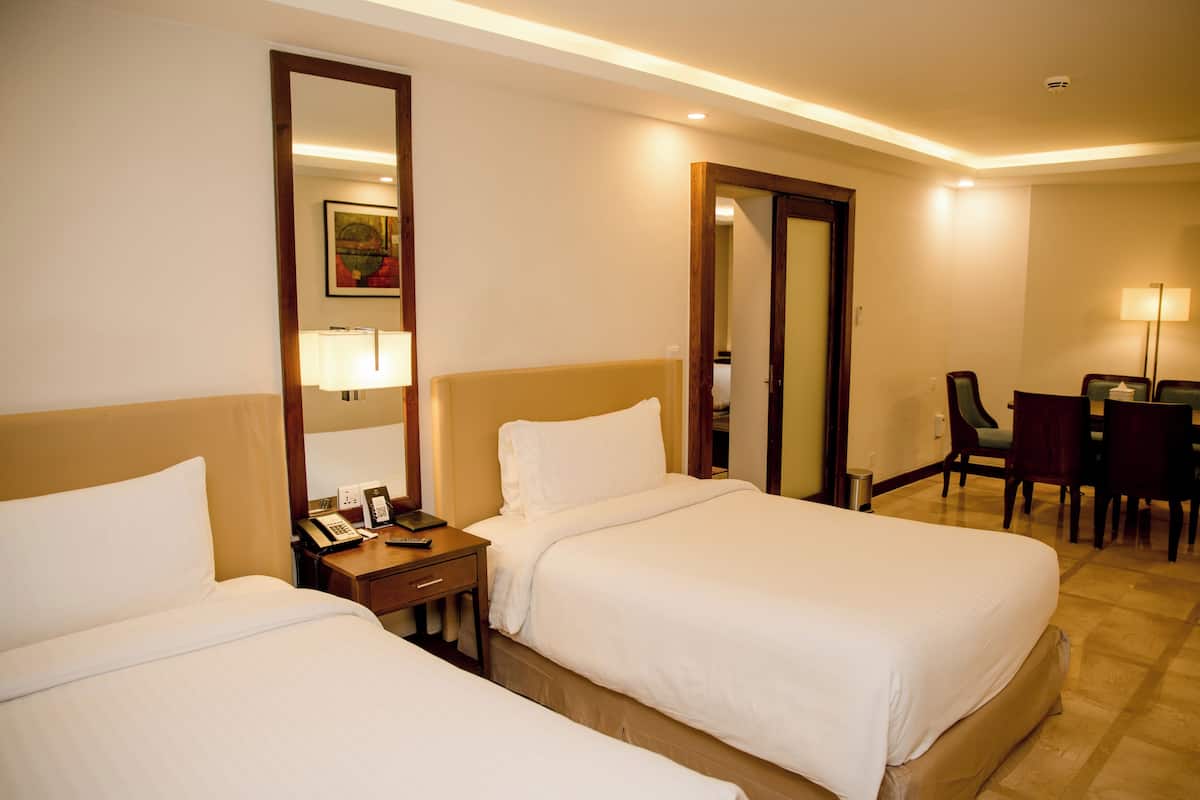 Family Suite | Minibar, in-room safe, desk, laptop workspace