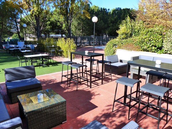 Breakfast, lunch, dinner served; Mediterranean cuisine, garden views 