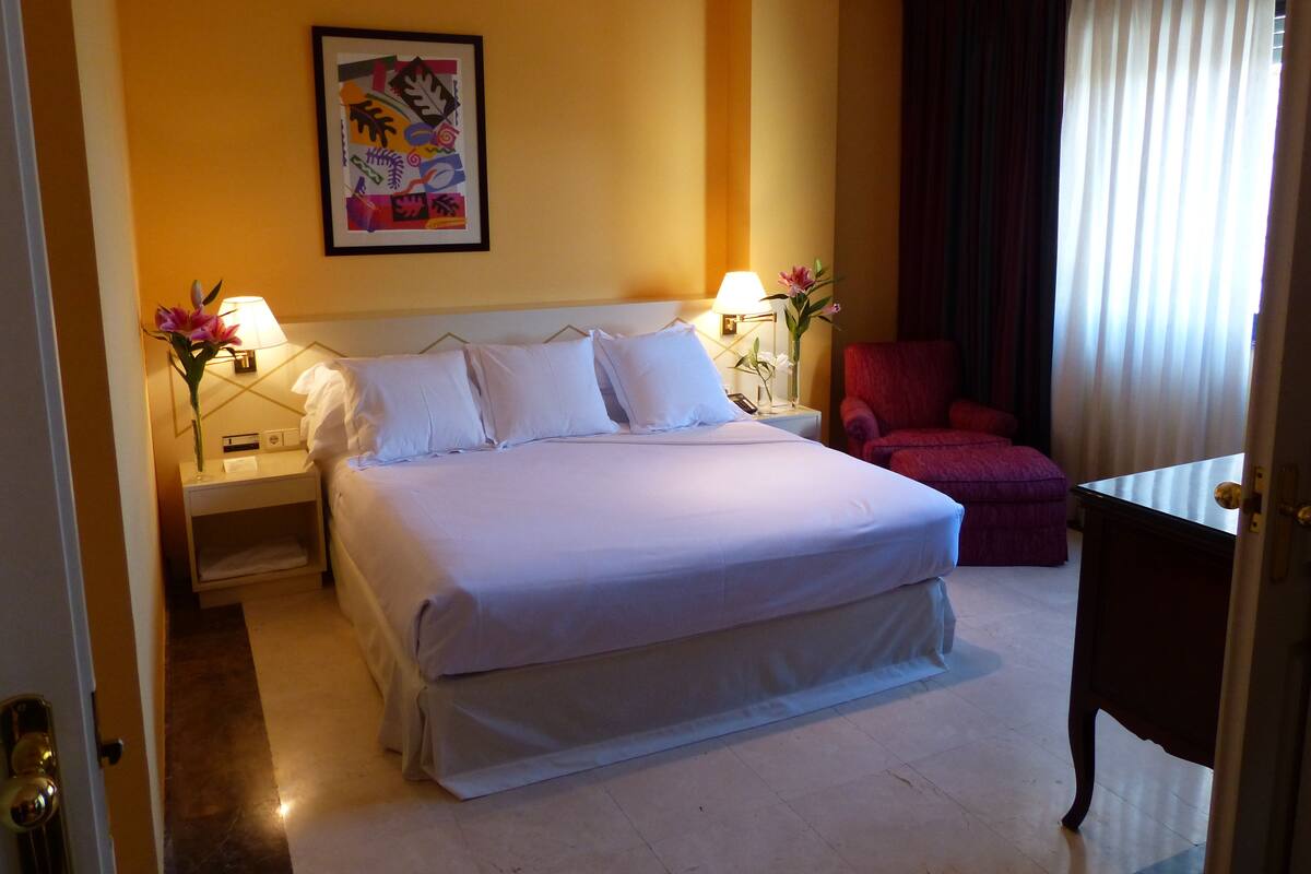 1 bilik tidur, peralatan tempat tidur premium, bar mini