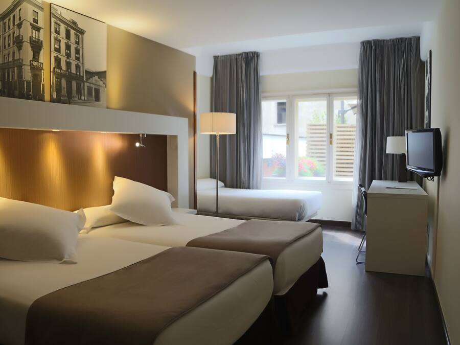 Hypoallergeen beddengoed, een minibar, een kluis op de kamer, een bureau