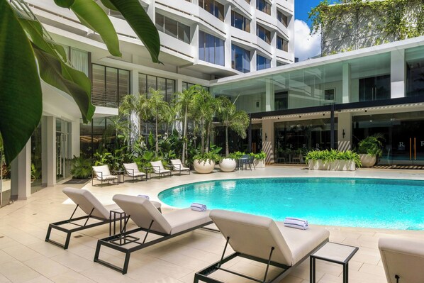 Outdoor pool, free cabanas, pool umbrellas