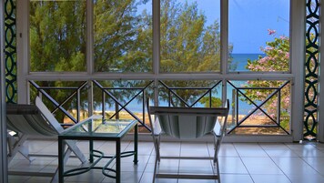 Quarto premier, 1 cama King | Vista para praia/oceano