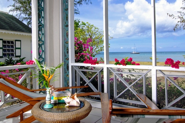 Habitación doble Deluxe, 2 camas matrimoniales | Vista a la playa o el mar