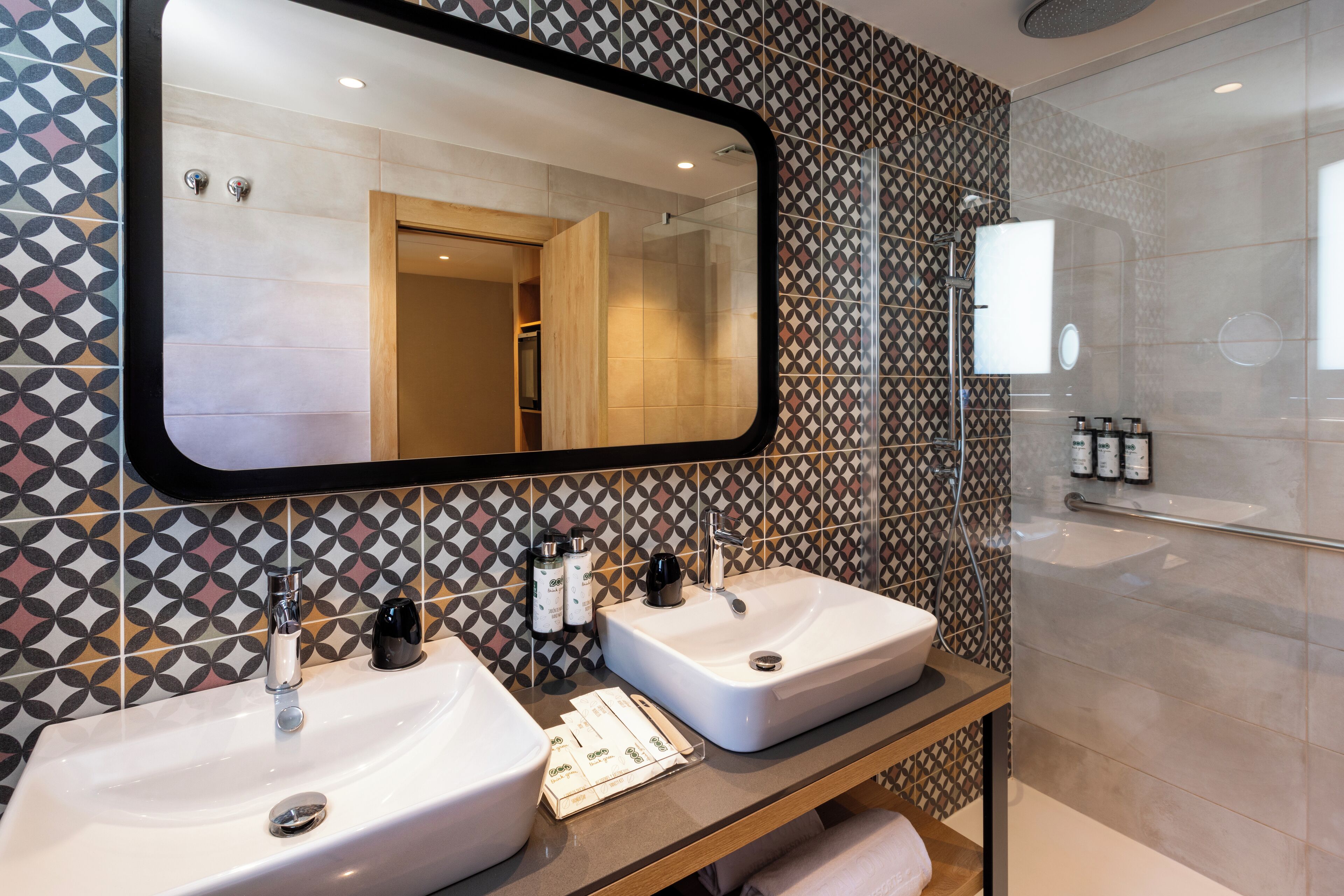 eco-friendly toiletries, hair dryer, towels