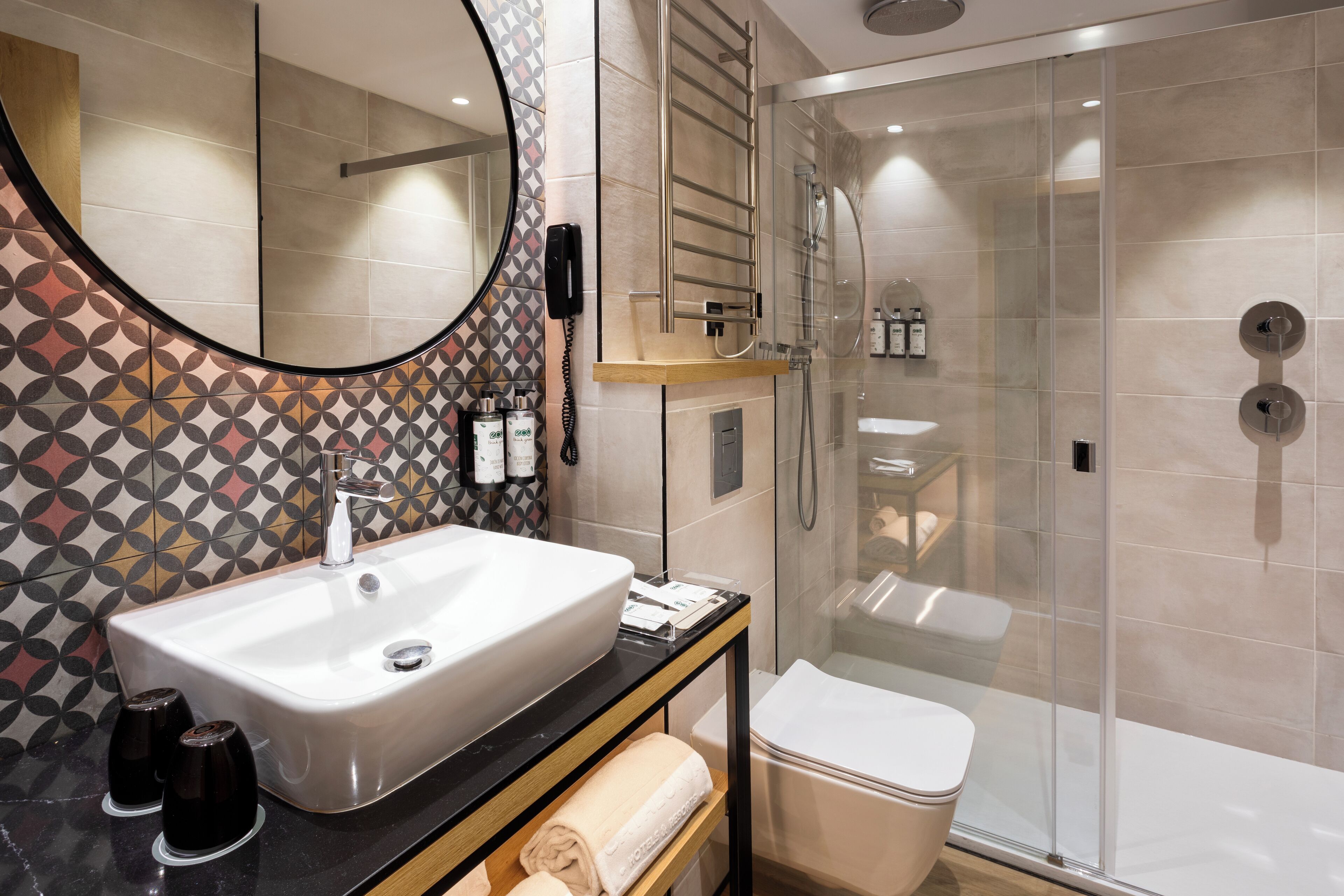 eco-friendly toiletries, hair dryer, towels