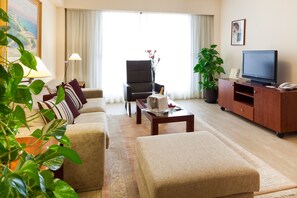 Junior Suite | Living room | 32-inch TV with cable channels