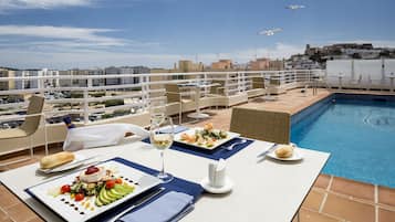 Outdoor pool, sun loungers