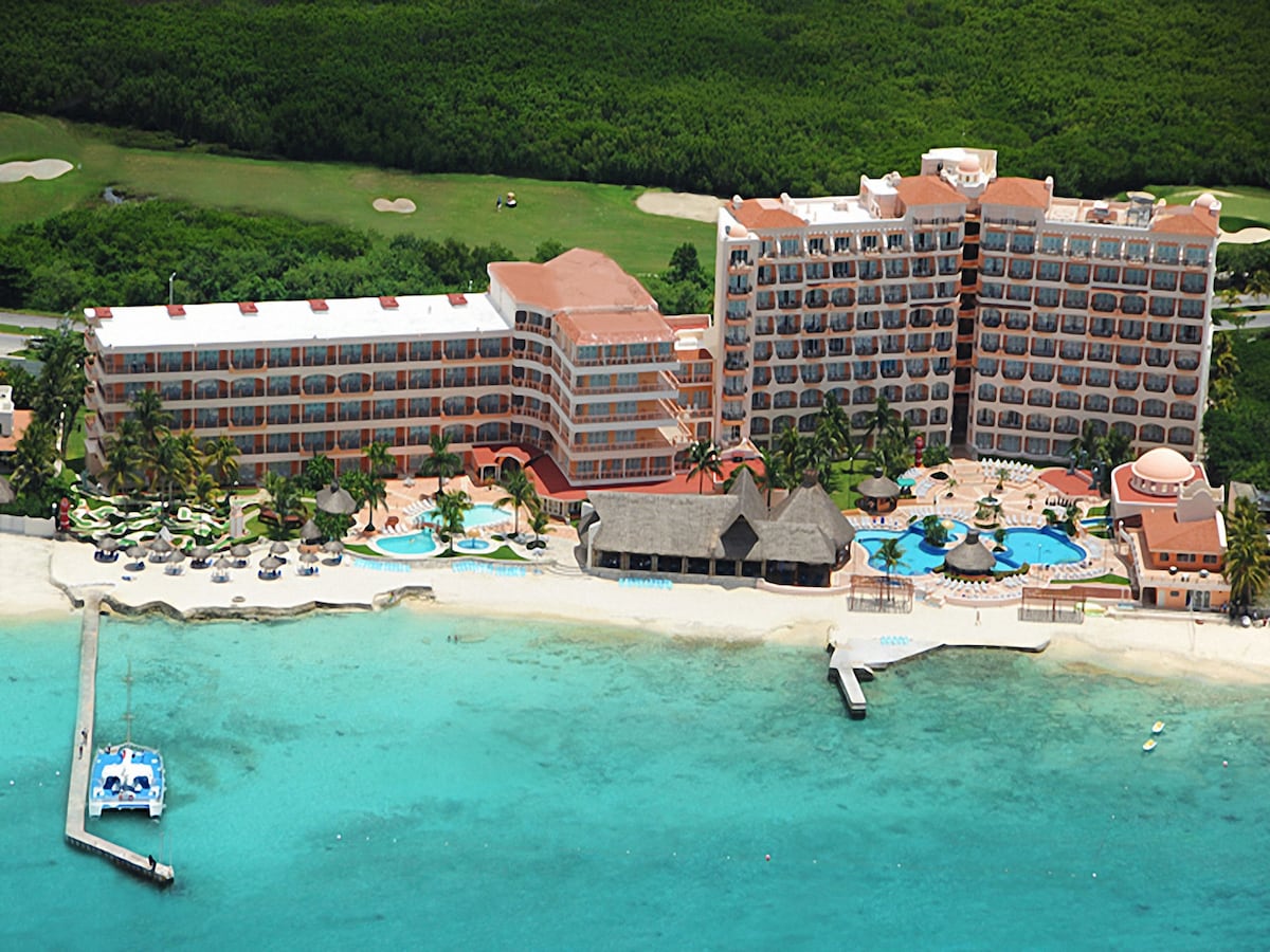 El Cozumeleno's high rise hotel with breathtaking oceanfront views and multiple pools to take a dip in.
