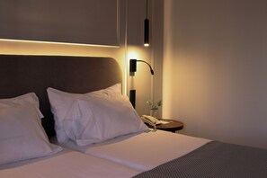 Ropa de cama de alta calidad y minibar 