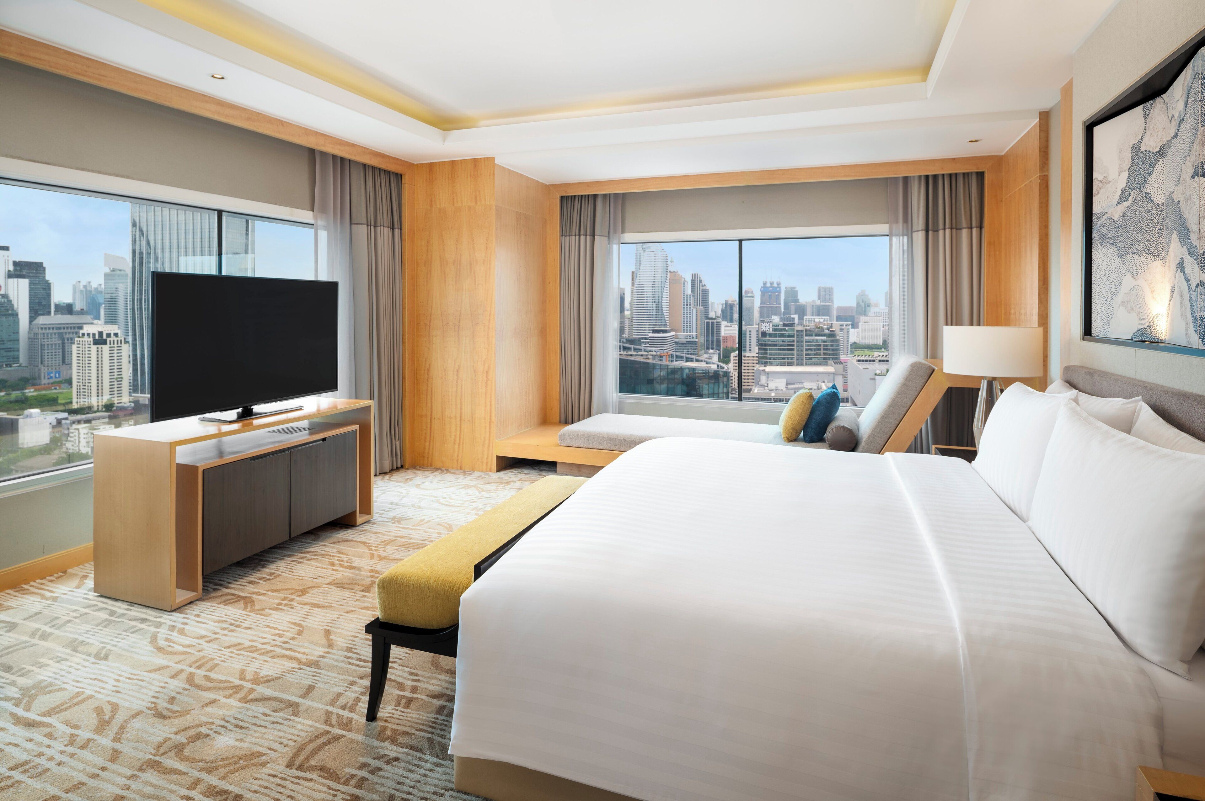 ห้องคลับสวีท, 1 ห้องนอน, ห้องมุม | ผ้าปูที่นอนฝ้ายอียิปต์, เครื่องนอนระดับพรีเมียม, ตู้นิรภัยในห้องพัก