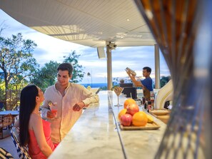 Cocktail bar, pool views, open daily