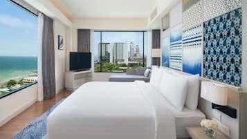 Club Executive Ocean Suite | Premium bedding, down comforters, in-room safe, individually decorated