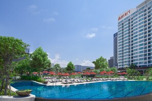 2 outdoor pools, open 7:00 AM to 7:00 PM, pool umbrellas, sun loungers