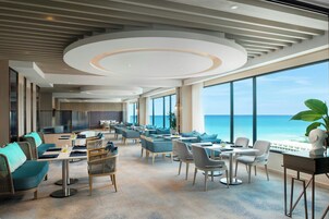 Lunch, brunch served; international cuisine, pool views 