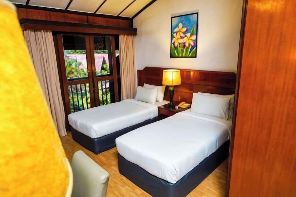 Minibar, desk, bed sheets