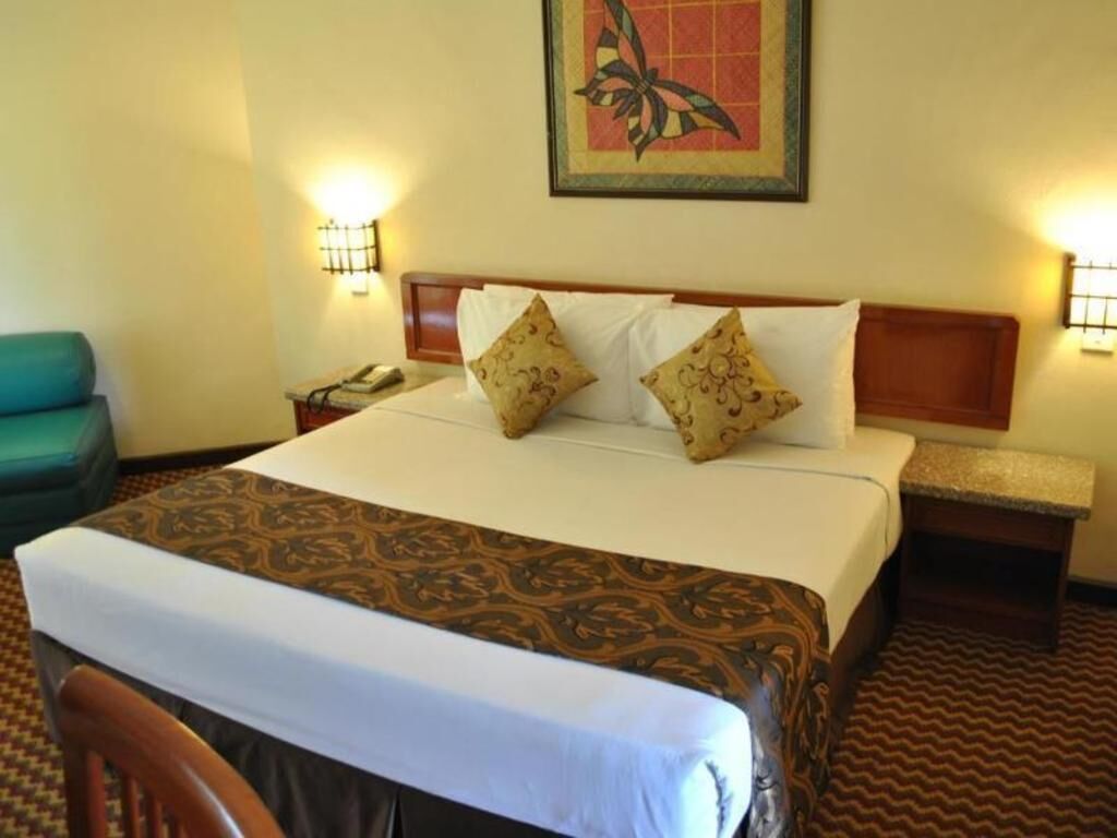 Minibar, desk, bed sheets