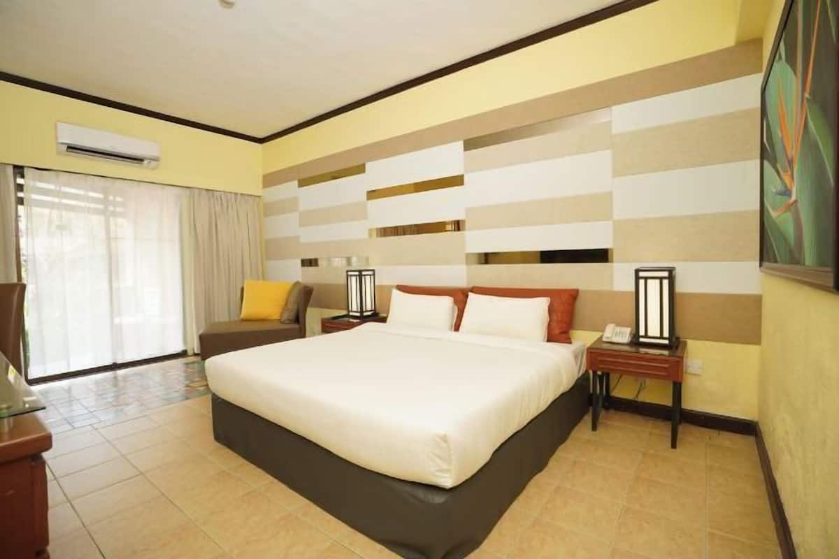Minibar, desk, bed sheets
