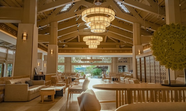 A spacious lobby with high ceilings, multiple seating areas, and large chandeliers. - Pelangi Beach Resort & Spa, Langkawi (Langkawi)