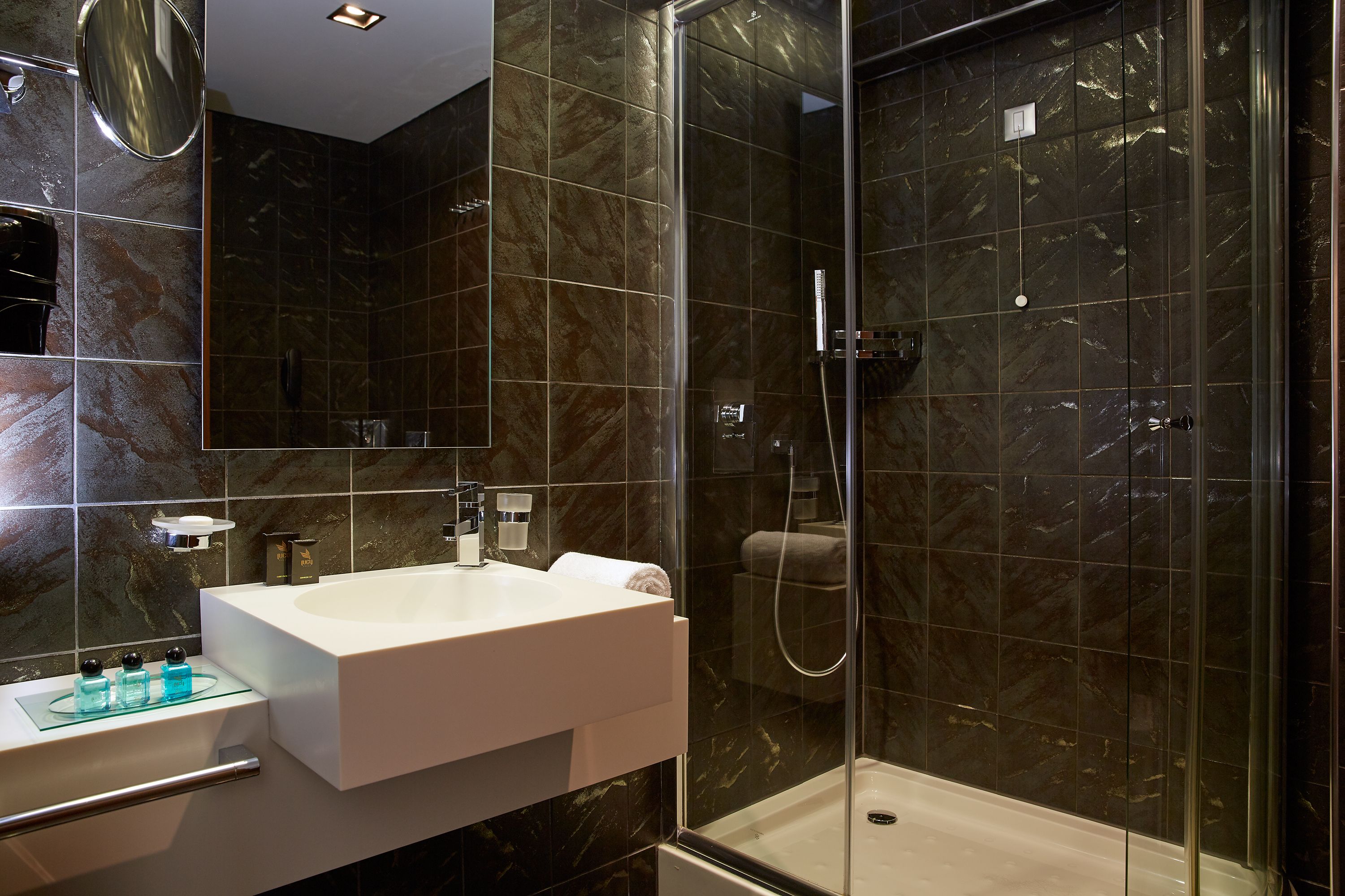 shower, rainfall showerhead, designer toiletries, hair dryer