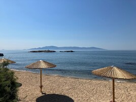 Sun loungers, beach umbrellas, beach towels, fishing